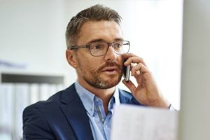 person speaking on mobile phone